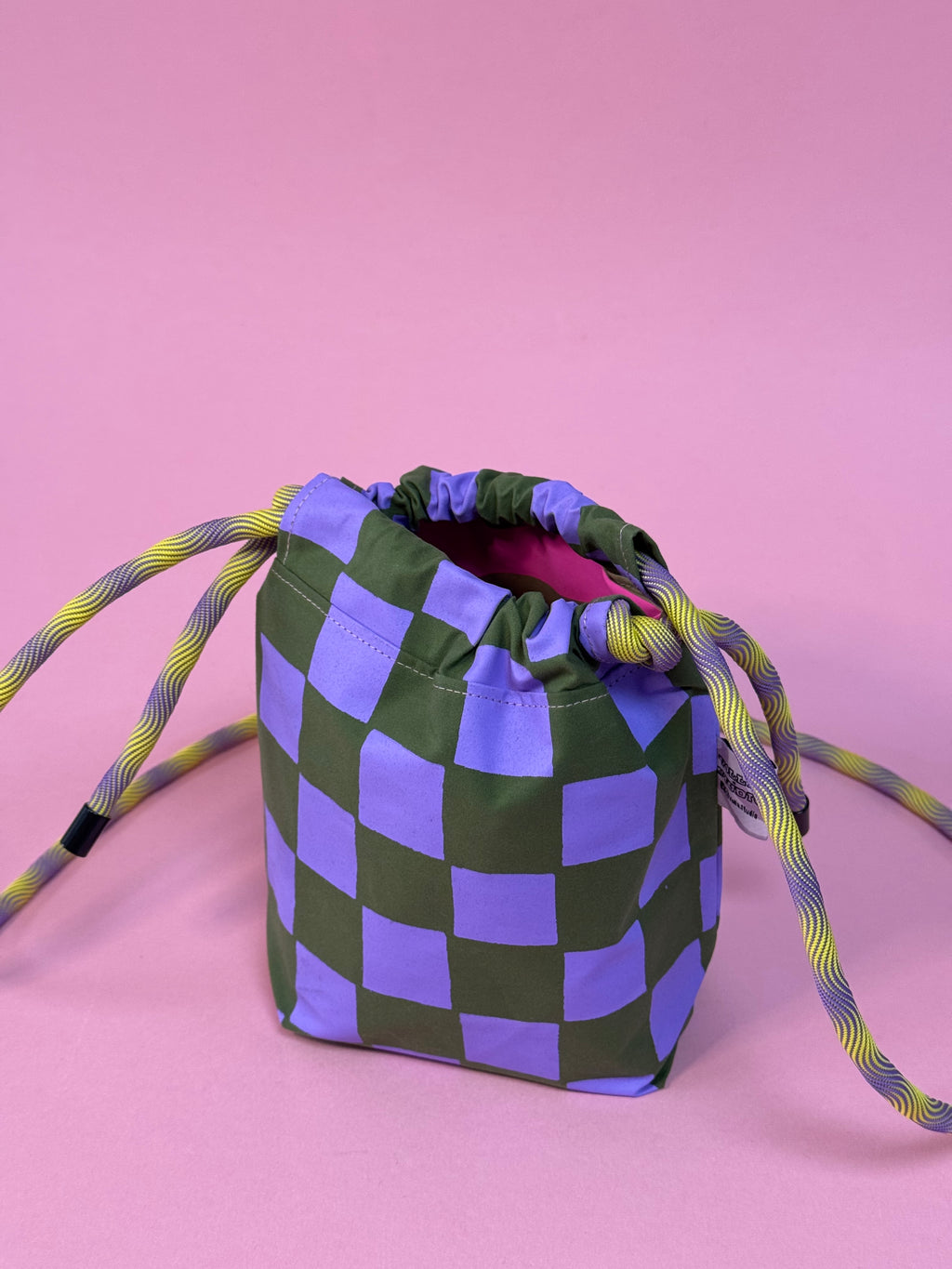 The Mini Drawstring Crossbody GREEN AND PURPLE CHECK
