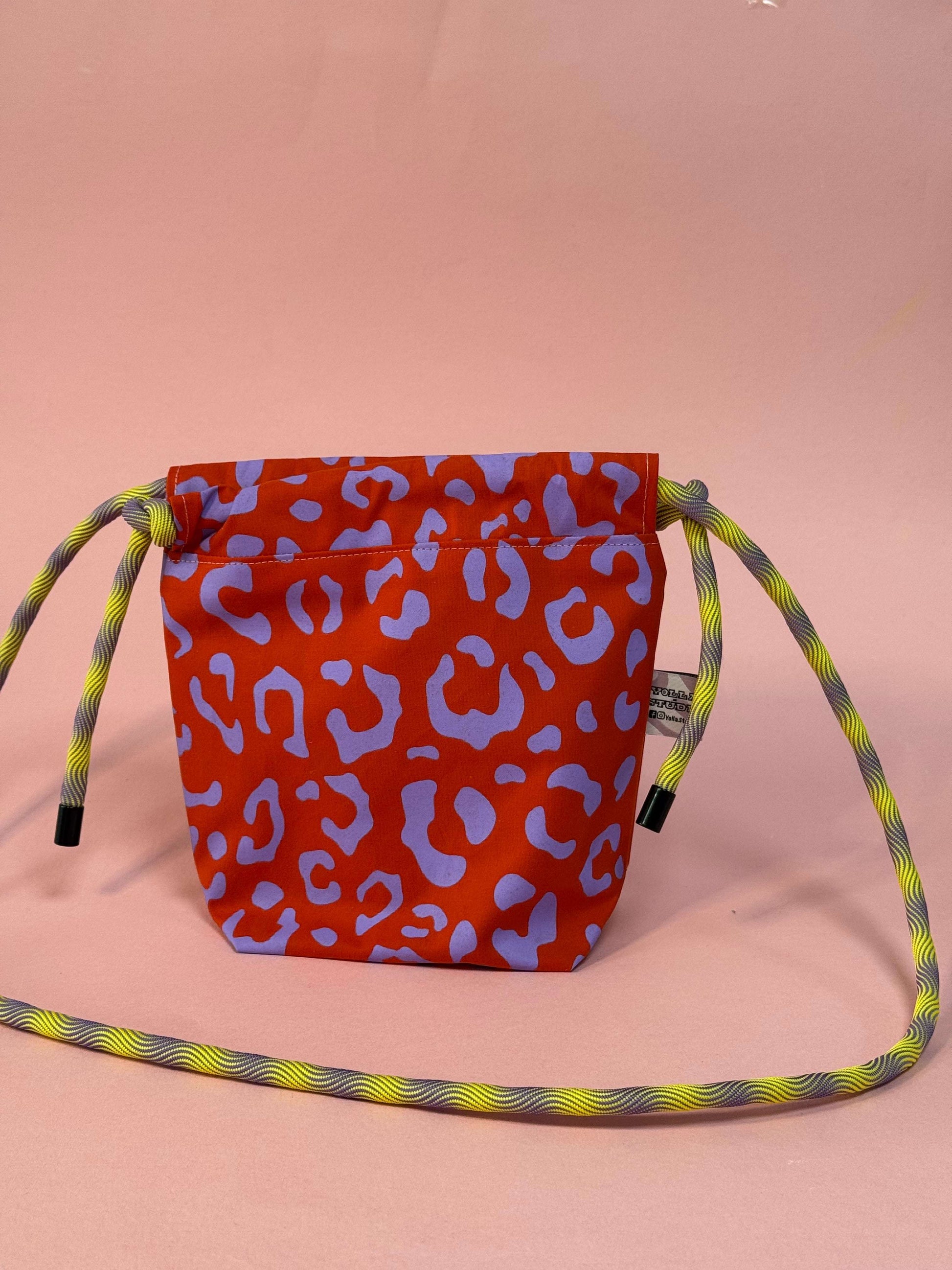 Mini Drawstring Crossbody - Funky Waxed Cotton Bag for Festivals & Dog Walks Purple and Red Leopard